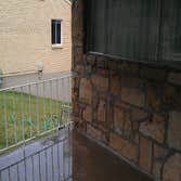 Project photos from Hollis Contracting Removed the original layer of the front house and faced it with sand stone.