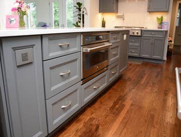 Rockville kitchen remodel with great ideas First floor renovation opening up the kitchen and family room by removing load bearing wall and adding a ste