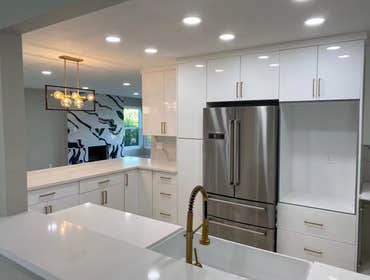 Photos by Pan Shi Construction Inc #1 Converted an existing garage into a fully functional Accessory Dwelling Unit (ADU), The project included framing 