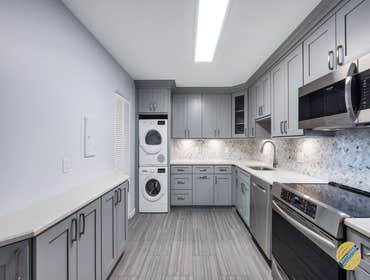 Gray Condo Kitchen Today we have a contemporary light gray kitchen at a condo we renovated last year! Since the space was smaller, we had to utilize it