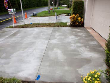 Jhm Construction Llc Project Drive Replacement - Before and After. JHM also applied a curing compound to help maximize the concrete strength for greate