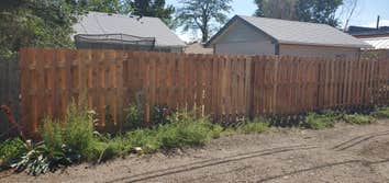 Photos by Colorado Painting & Construction Pros #2 Old fence that was damaged by wind constantly and built new one with opposite pickets to let air flo