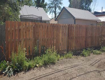 Photos by Colorado Painting & Construction Pros #2 Old fence that was damaged by wind constantly and built new one with opposite pickets to let air flo