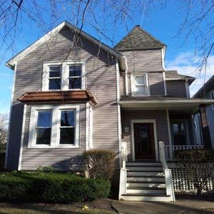 Project photos from Genesis Property Restoration Inc. Roofing, gutter work, siding, window replacement