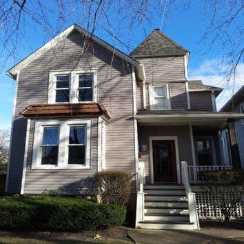 Project photos from Genesis Property Restoration Inc. Roofing, gutter work, siding, window replacement