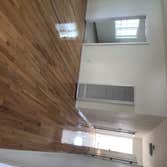 Photos by Custom Hardwood Flooring Refinishing Installation #3 Sand hardwood flooring and refinish with three coats of polyurethane finish