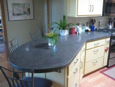 Remodel Demo and Remodel Bathroom, and Installation of Hardwood and Saltillo Tile Flooring.