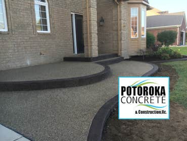 Exposed aggregate Patio photo by Potoroka Concrete