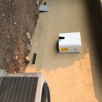 Photos by All HVAC and General Construction #1 New outdoor tankless water heater
