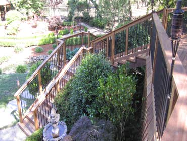 1200 sq. ft. Batu deck with Ipe posts and deckorator rails This awesome deck is surrounded by a gorgeous backyard with a natural running stream. The de