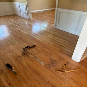 Photos by Floormasters & Design #1 Hardwood floor sanding and refinishing with some repairs.