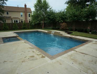 Photos from Crystal Blue Aquatics Llc New Construction of pool with full automation, LED lighting, high end travertine patio decking, beautiful water f