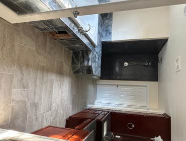 Photos by J&r Construction LLC #2 Here is a master bathroom just completed. This is a full bathroom remodel and included installing a larger jacuzzi tu