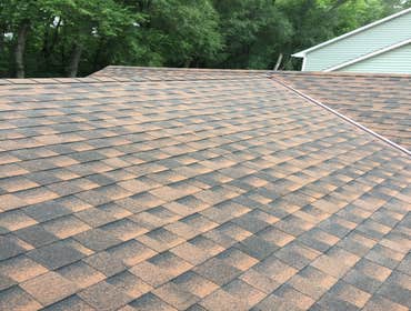 Photos by K and M Construction of Minnesota #1 GAF TIMBERLINE HD SHINGLES