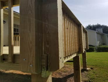 Deck Rebuild demo & haul-off existing deck with the following issues: 1) open risers 2) missing flashing 3) deteriorated handrails 4) loose guardrailin