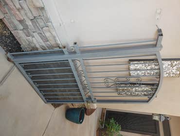 Photos by Alpha Commercial Doors LLC #3 Add Style To Your Home!
Installation of a new Courtyard Gate.
Our decorative custom courtyard gates add eleganc