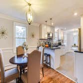 Upper Marlboro Project In this kitchen we installed J&K S8 White Shaker cabinets and Steel Gray Leather granite counter-tops.
