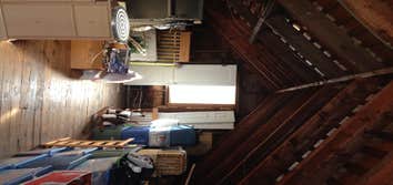 Attic Remodel We turned this unused attic space into a bedroom with lots of shelves and closet space.