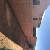 New Block Wall and Gates Replaced old rotted wooden fence and gates with New Interlock Block wall. New metal framed gates with wood privacy panels.