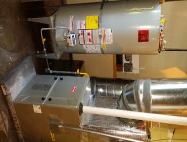 New mechanical system in san francisco Removed an old radiator steam boiler.
Installed two bryant gas furnaces and ducts and two state water heaters. 