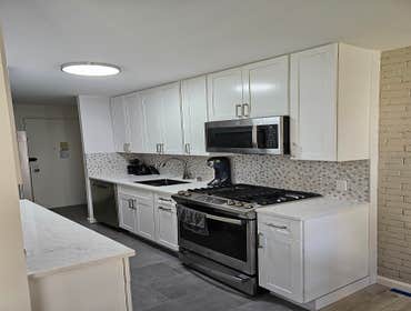 Photos by Jc Construction Ny Corp #3 Renovated kitchen, flooring, removed/renovated shelves, and painted the apartment