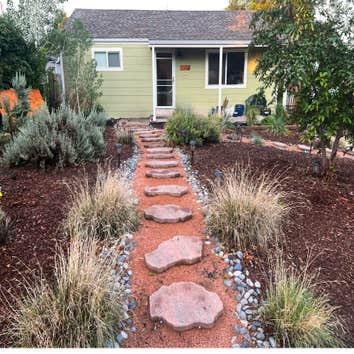 Photos by Rosenberg Landscaping, LLC #1 Our client wanted a xeriscape oasis, so we relocated or removed existing high-water use plants, laid down a wee
