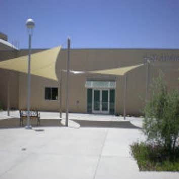 Commercial Construction This addition in 2006 features a new courtyard with covered seating. Shaded structure outside of St. Andrew's Sanctuary.
