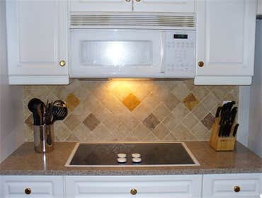 Tumbled marble backsplash