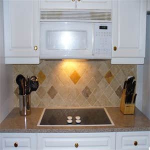 Tumbled marble backsplash