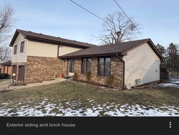 Photos by Mgm K Contractors Inc #2 Complete roof replacement window wraps gutters downspouts along with complete siding replacement