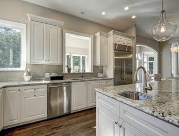 GULICK | CUSTOM Home in McLean The impressive stone and HardiePlank® elevation on our Winthrop really stood out on this corner lot of approximately one