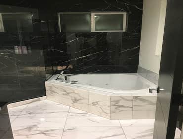Tile Projects by Nobleman Construction Tile installation, repair, replacement. Complete bathrooms and kitchen remodels.