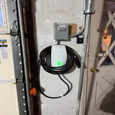 Photos by Lmlk Inc #3 Tesla Wall Connector installation completed for a residential property. Approximately 70 feet of electrical conduit was installed