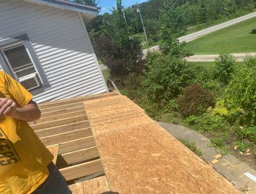 Photos by C.S Remodeling & Construction #1 Dust protection and entry to home protection temporary wall built to prevent anyone or anything from getting