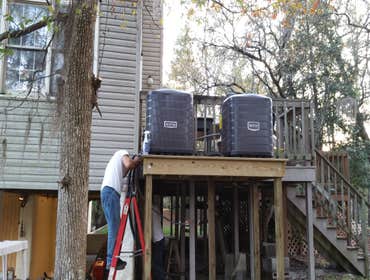 Photos by Air Time of the Carolinas #2 replaced 2 full split systems and put on 8 ft stand after the flooding of hurricane Matthew.