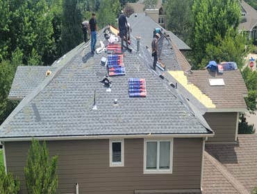 Photos by Synergy Roofing and Solar