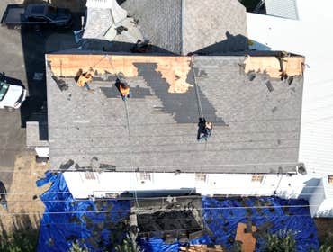 Photos by Hawthorne General Construction #4 32 squares of Pabco diamond-shaped shingle on this old church featured on the Oprah Winfrey show. This is a