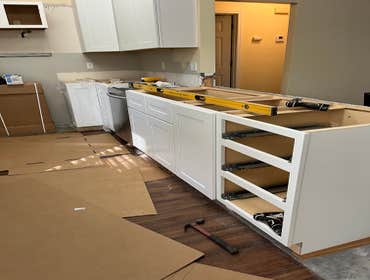 Photos by Tropical Building & Remodeling Inc #1 Completely removed old kitchen and end pony wall. Cut down pony wall to cabinet height and installed ro
