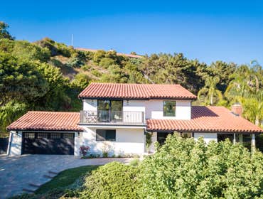 Malibu Major Remodel and exterior Complete gut and remodel with an addition. New windows and doors, Extension of balcony and removal of interior walls.