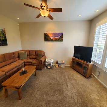 Photos by KormexLLC Kitchen/Living room before/after Refinishing cabinets from an old oak stain to a two tone color scheme. Adding a glass face to a ca