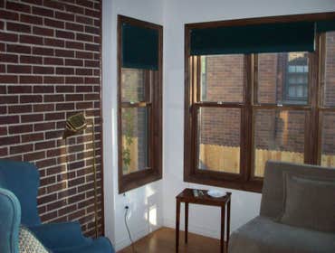 Sun Room addition with a new fence
