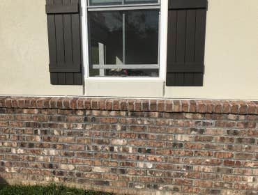 Repairing stucco cracks in Burgettstown We repaired stucco cracks under many windows on house that was already done. We also repaired a balcony damaged