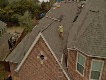 Photos by Top Notch Roofing #2 New Laminate Roof