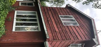 Photos by Rekut Remodeling Services LLC #1 Residing on South face of house.