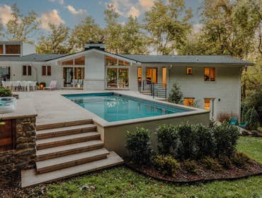 Hillside Retreat For Hillside Retreat, Pivot Construction delivered a complete transformation of the outdoor living environment — including pool and sp