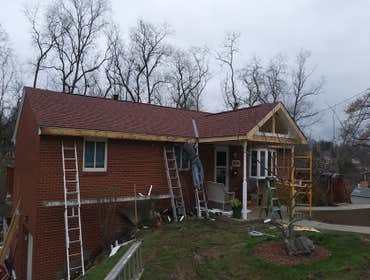 Full roof and newly constructed front porch