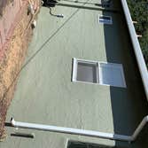 Photos by Ta Painting #1 On this house the paints was peeling ,we scraping, patch,primered with stop peeling then we painted with elastomeric paint