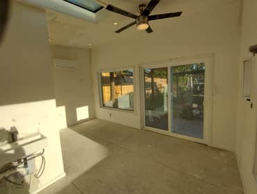 Photos by Stewart & Son Gate & Fence LLC #1 Tiny House with pergola. Small house 17' by 12' small bathroom with pocket door, and small sink with water 