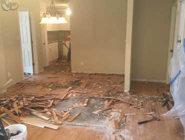 Residential renovation Renovation of existing kitchen and dining space to create an open floor plan with new dining island, wine/bar area and kitchen 