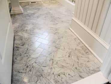 Baine Contracting Inc Project Multiple jobsites - showing kitchens, interior and exterior trim work, new homes, bathrooms, tile work, wood and iron ra